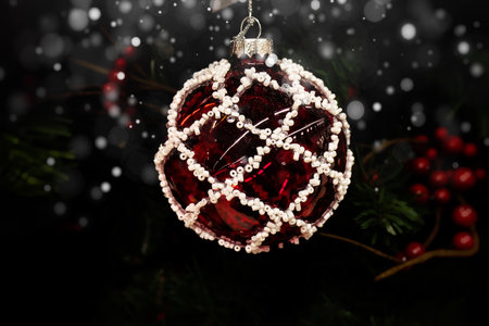 beautiful christmas bauble on a festive backgroundの写真素材