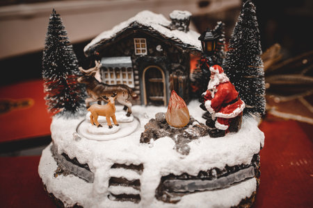 beautiful Christmas decorations with moving figurines on a winter backgroundの写真素材