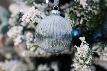 beautiful christmas bauble on a festive backgroundの写真素材