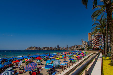 beautiful panorama view on a sunny day on the city of Benidorm Spainの写真素材