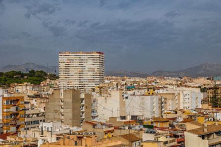 beautiful view on a sunny day of the city and colorful buildings from the viewpoint Alicante Spainの写真素材