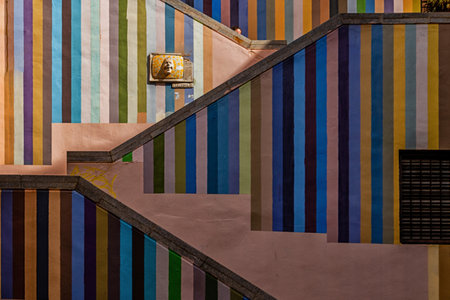 beautiful stairs street in alicante spain striped decoration on a summer day landmarkの写真素材