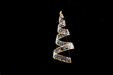 large Christmas tree glowing decoration on the street