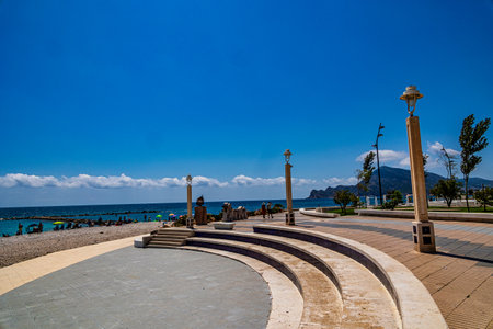 beautiful beach in the Spanish city of Altea on a warm sunny summer dayの写真素材
