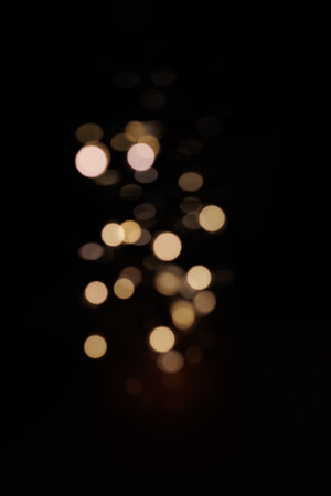 cute background with golden bokehの写真素材