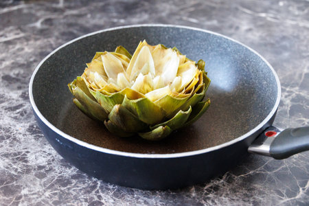 beautiful large green cardoons in the panの写真素材