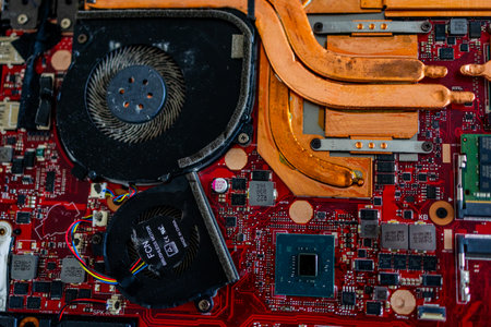 A close up view showcases a motherboard with intricate circuit patterns, RAM modules, and various electronic componentsの写真素材