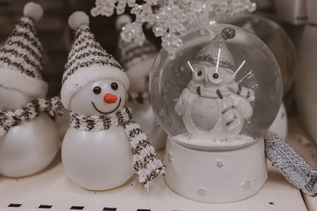 A cheerful snowman figure, complete with a red noseの写真素材
