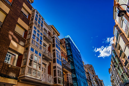 A grand historic building is centered within a lively square in Cartagena.の写真素材