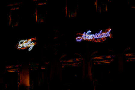The words Feliz Navidad are written in a festive script.の写真素材