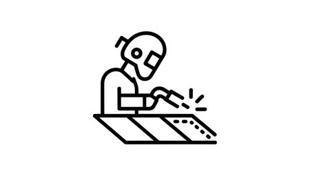 A black line drawing depicts a welder in protective gear.のイラスト素材