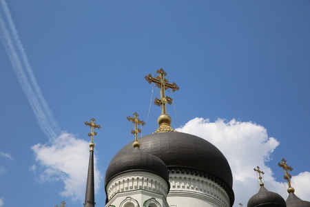 Beautiful Orthodox Church, summer, sunlight playing on the Golden dome, on the background of blue sky.の写真素材