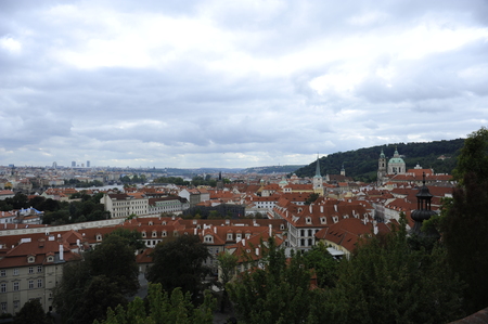 View of old red tiles roofs in the city prague czech republic europe beautiful at beautiful summer dayの写真素材
