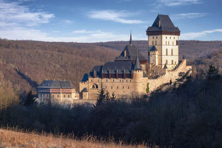 Karlstejn, Czech republic - April 01, 2020: Karlstejn castle in winter time in warm morning sunのeditorial素材