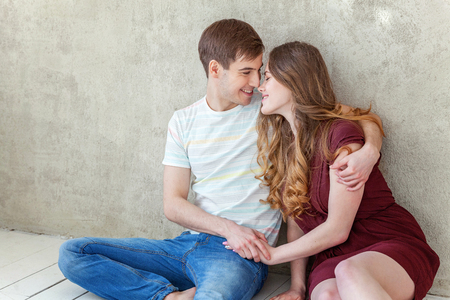 Couple in love having nice time together. Young happy woman hugging boyfriend, white background. Students, bride, groom, engagement, relationship, aspirations, supporting relying concept Bannerの写真素材