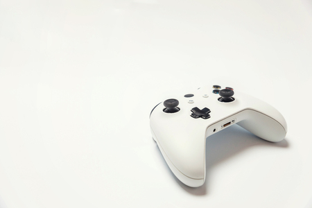 White joystick gamepad, game console isolated on white background. Computer gaming technology play competition videogame control confrontation concept. Cyberspace symbolの写真素材