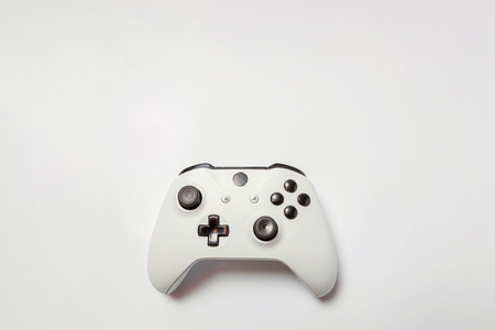White joystick gamepad, game console isolated on white background. Computer gaming technology play competition videogame control confrontation concept. Cyberspace symbolの写真素材