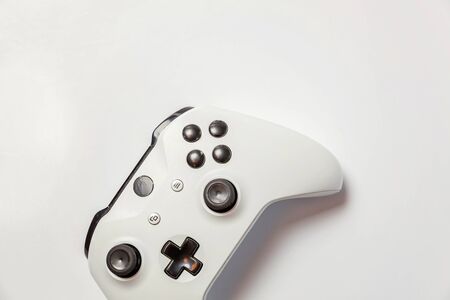 White joystick gamepad, game console isolated on white background. Computer gaming technology play competition videogame control confrontation concept. Cyberspace symbolの写真素材