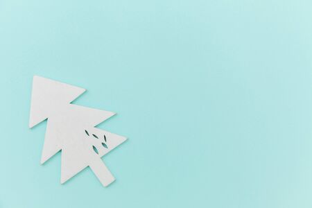 Simply minimal composition winter object ornament fir tree isolated on blue pastel trendy...