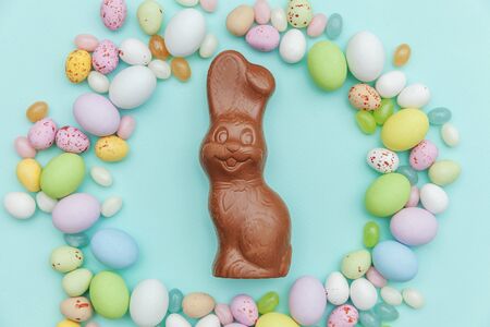 Happy Easter concept. Preparation for holiday. Easter candy chocolate eggs bunny and jellybean...