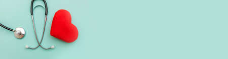 Simply minimal design with medicine equipment stethoscope or phonendoscope and red heart isolated on...