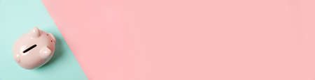 Simply minimal design piggy bank isolated on pink blue geometric background. Saving investment...