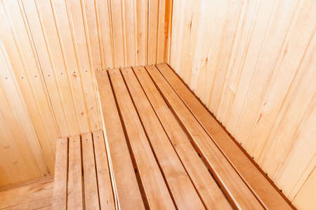 Interior details of traditional Finnish sauna steam room. Traditional old Russian bathhouse SPA Concept. Relax country village bath conceptの写真素材