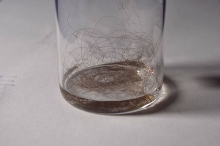 Chemical experiments with chemicals, flasks and mixing chemicals.の写真素材
