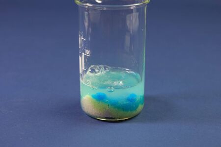 Chemical experiments with chemicals, flasks and mixing chemicals.の写真素材