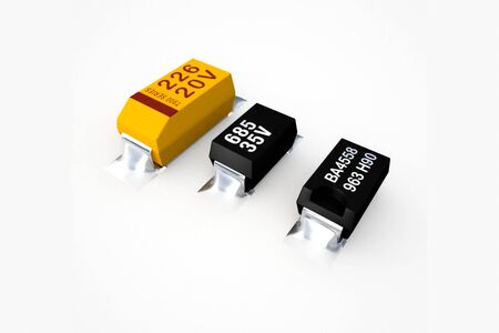 Diodes and transistors on a white background, electronics based on tantalum.の写真素材