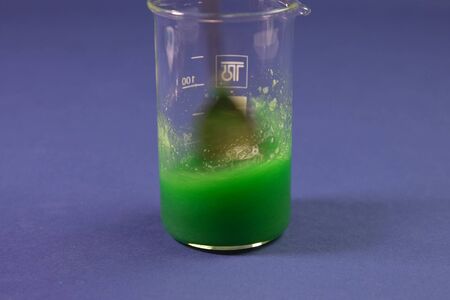 Chemical experiments with chemicals, flasks and mixing chemicals.の写真素材