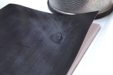 Liquid nitrogen on notebook paper. Liquid nitrogenの写真素材
