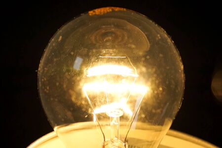 a Incandescent light bulb, light bulb lamp.