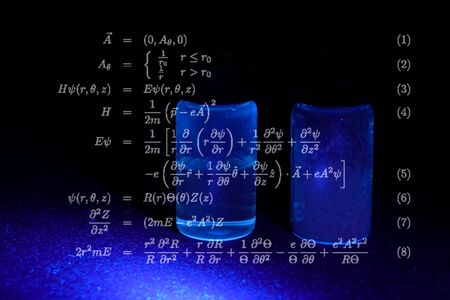 Mathematical formulas and calculations on a blue backgroundの写真素材