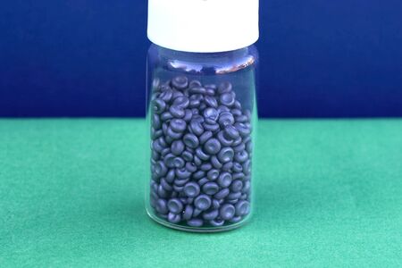 selenium in a test tube in the form of hemispheres.の写真素材