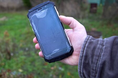 a Screen broken smartphone. Split screen sensorの写真素材