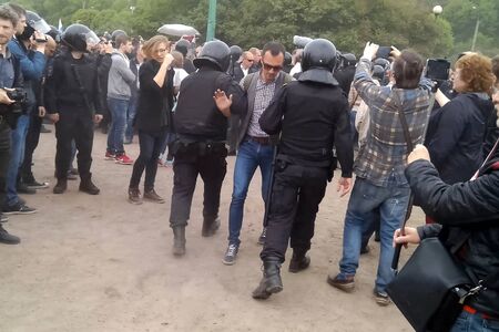 Moscow, Russia - June 12, 2017: A rally against corruption on the Champ de Mars in Moscow. Police arrest protesters.のeditorial素材