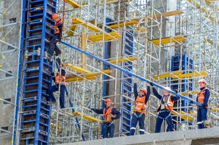 Tobolsk, Russia - June 14, 2018: Construction of a petrochemical and oil refinery near the city of Tobolsk in Russia, workers working on the installation and construction of the plant.のeditorial素材
