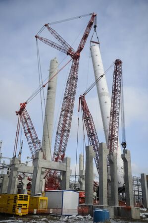 Tobolsk, Russia - June 14, 2018: Construction of a petrochemical and oil refinery near the city of Tobolsk in Russia, workers working on the installation and construction of the plant.のeditorial素材
