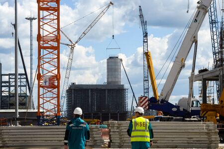 Tobolsk, Russia - June 14, 2018: Construction of a petrochemical and oil refinery near the city of Tobolsk in Russia, workers working on the installation and construction of the plant.のeditorial素材