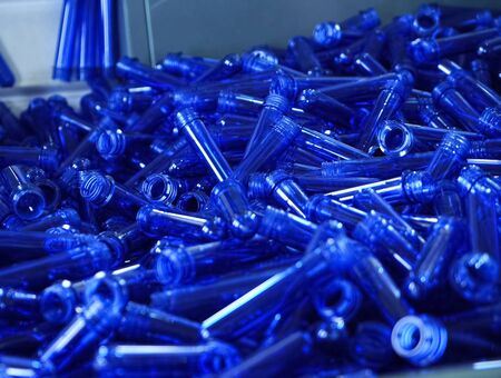 A warehouse of empty blue plastic flasks.の写真素材