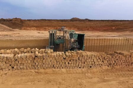 Shell quarry quarry. Cutting a seashell into blocks right away in a quarry.の写真素材