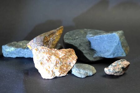 Non-ferrous metal stones. Stones on the table.の写真素材