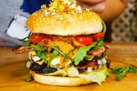 Hamburger on the table. fast food sandwich. Delicious appetizing sandwich, fast a fast food.の写真素材