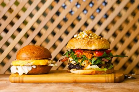 Hamburger on the table. fast food sandwich. Delicious appetizing sandwich, fast a fast food.の写真素材