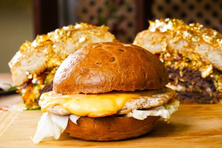 Hamburger on the table. fast food sandwich. Delicious appetizing sandwich, fast a fast food.の写真素材