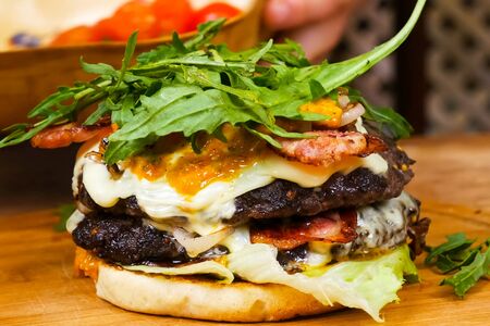 Hamburger on the table. fast food sandwich. Delicious appetizing sandwich, fast a fast food.の写真素材