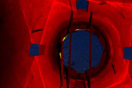 View of the starry sky through the opening of the water tower. Stars in the sky.の写真素材