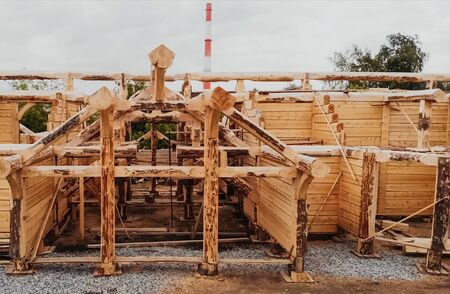 Part of the structure of a wooden house, details of a truss wooden structure, a house from a log house.の写真素材