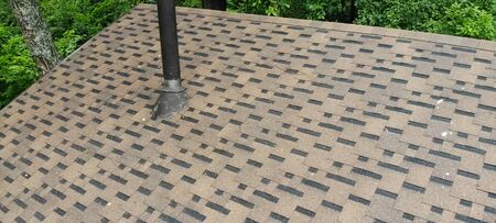 Bituminous tile for a roof. a roof from a bituminous tile.の写真素材